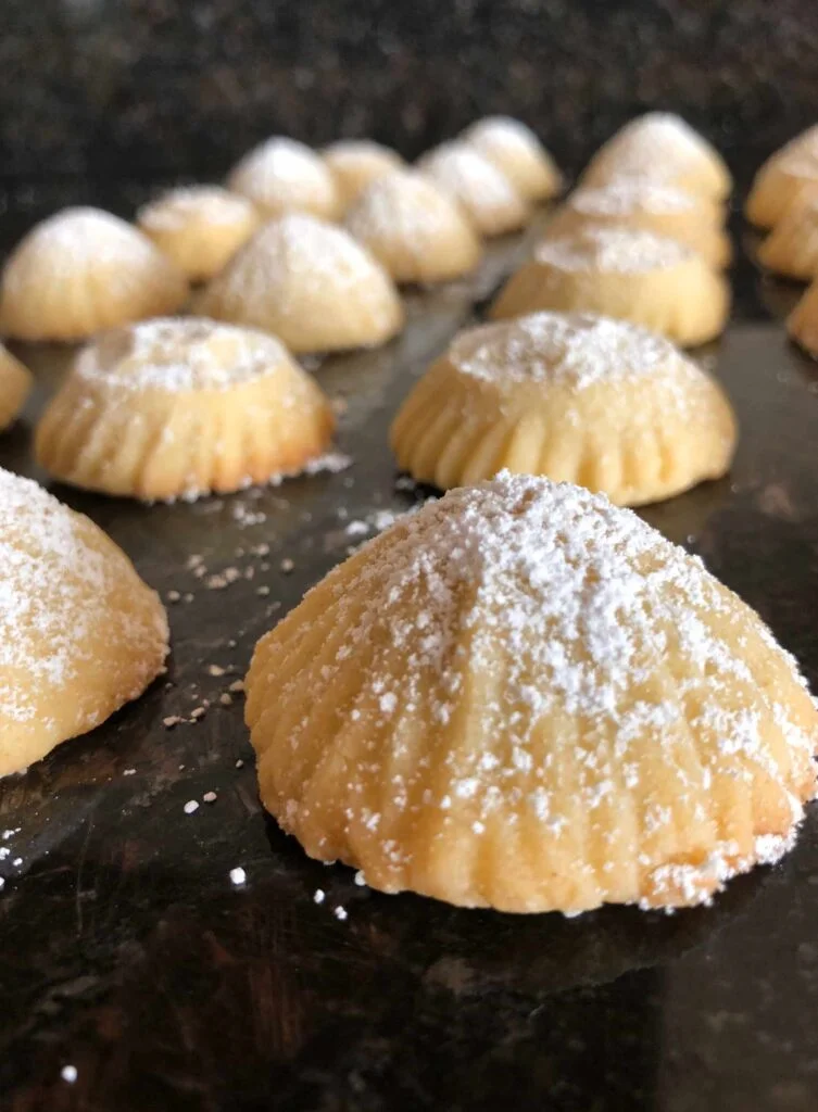 Maamoul cookies dusted with powdered sugar