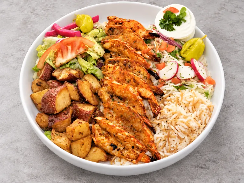 Shrimp bowl with rice, potatoes and salad