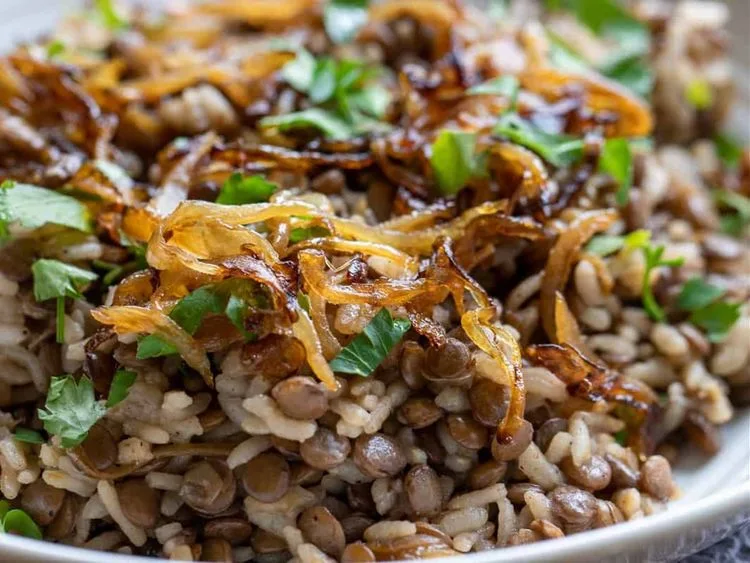 Rice and lentils topped with browned onions