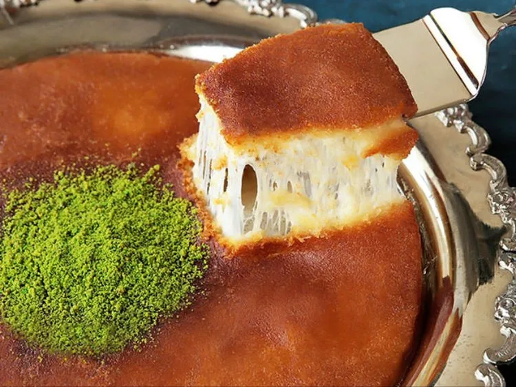 Kunefe with a stretchy cheese filling