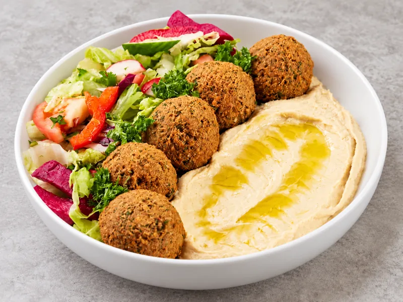 Falafel bowl with hummus, rice and vegetables