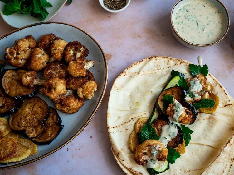 Roasted vegetables with tahini and flatbread